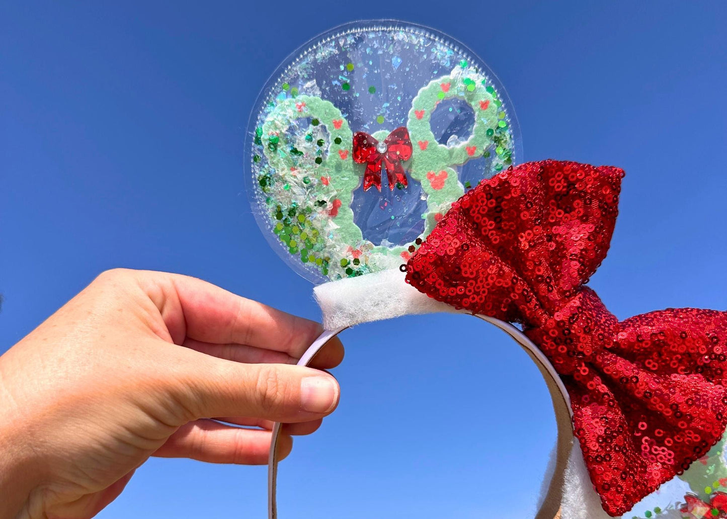Christmas Wreath Mickey Ears - Holiday Snow Globe Mouse Ears with Red Sequin Bow, Handmade Glitter Disney Park Ears for Christmas Vacation