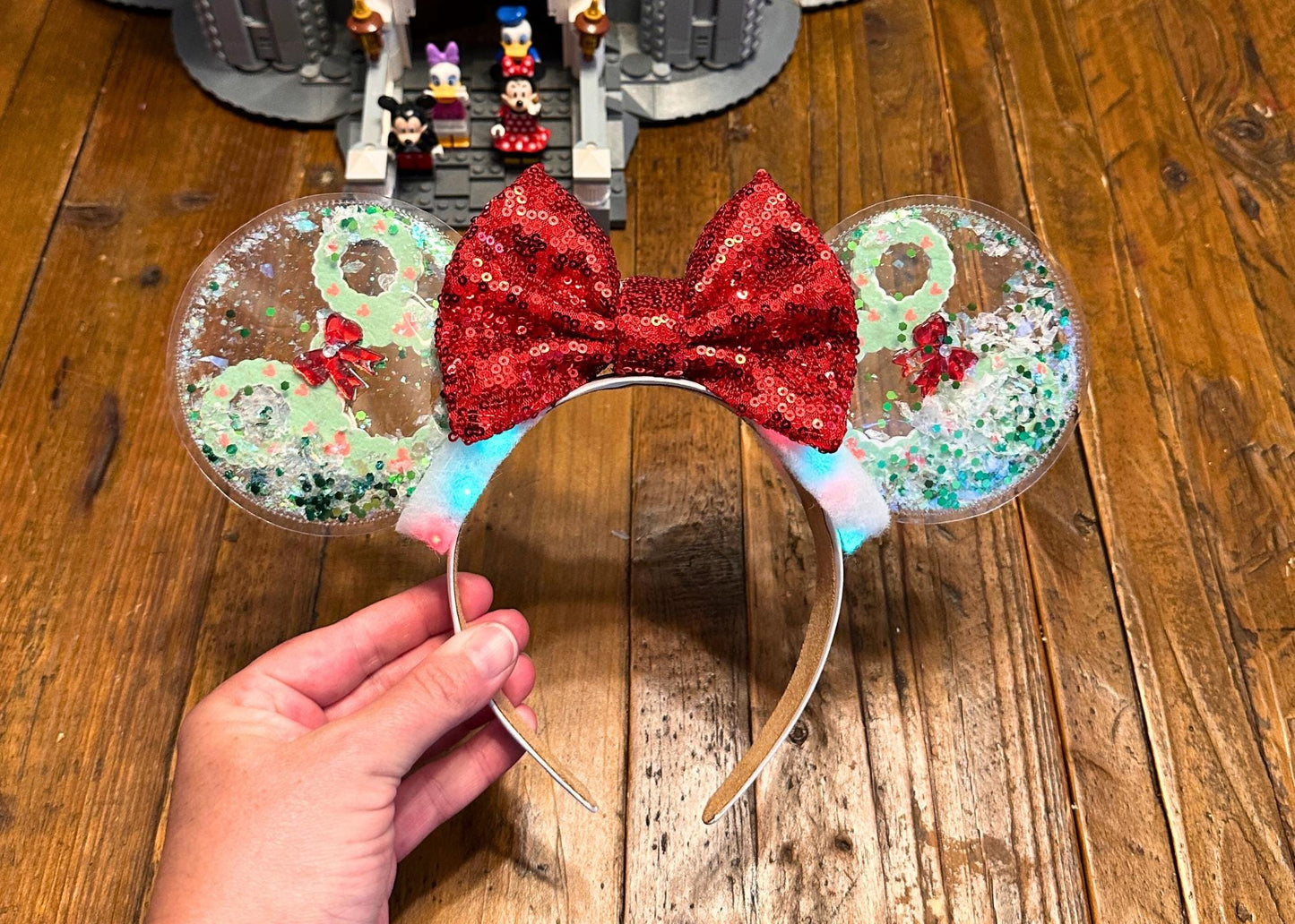 Christmas Wreath Mickey Ears - Holiday Snow Globe Mouse Ears with Red Sequin Bow, Handmade Glitter Disney Park Ears for Christmas Vacation