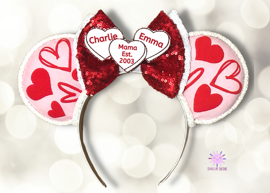 https://sparklemysunshine.com/cdn/shop/products/CopyofValentine_sPersonalizedCandyHeartsEars-2.png?v=1671551774&width=533